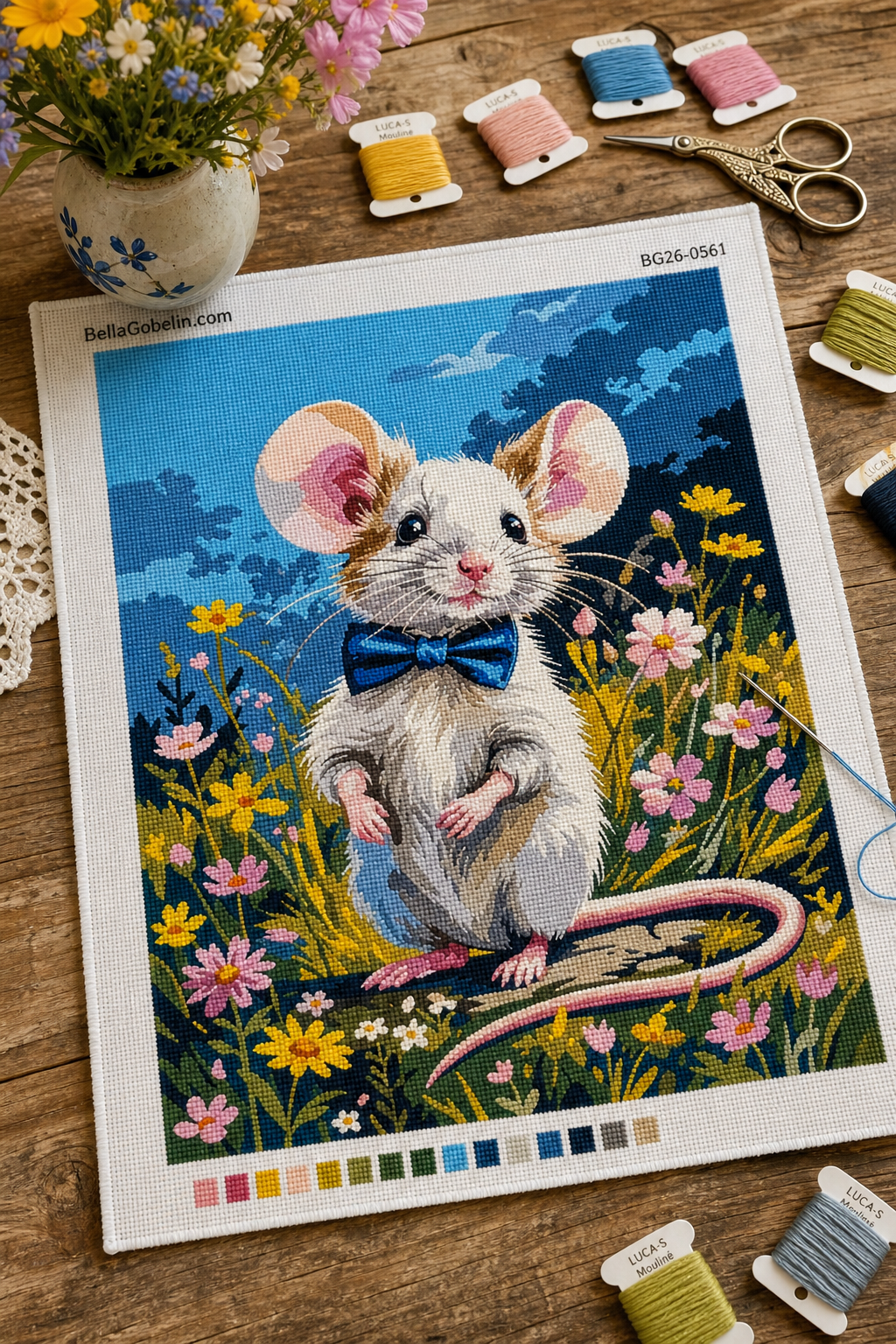 Elegant little mouse in a flowery meadow