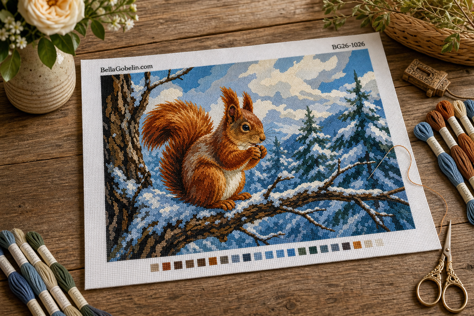 Squirrel on a snowy branch